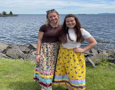 Miera (left) and Maya (right) reconnect after studying traditional medicines in Belize.